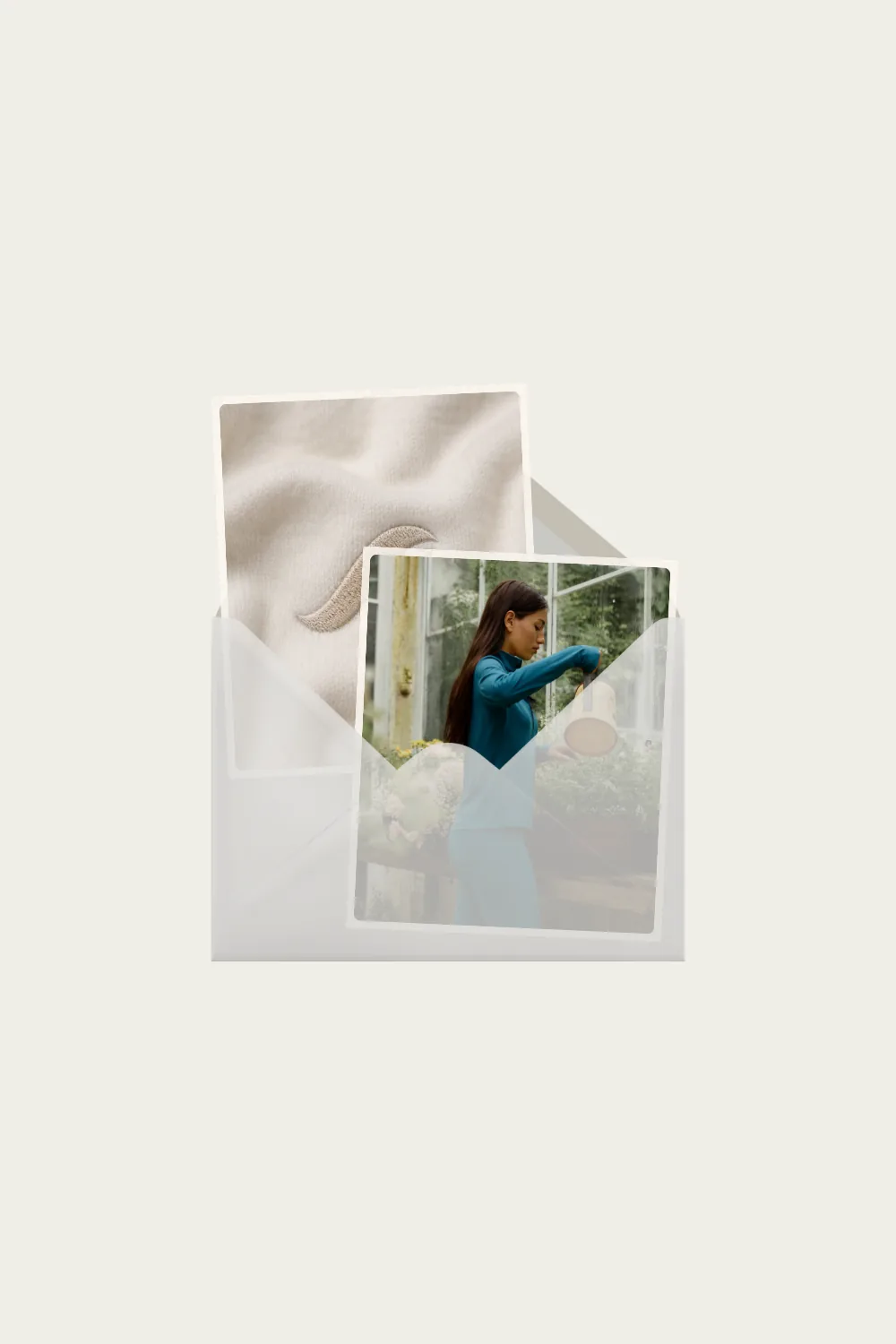 An envelope of brand cards with a photo of a woman watering greenhouse plants